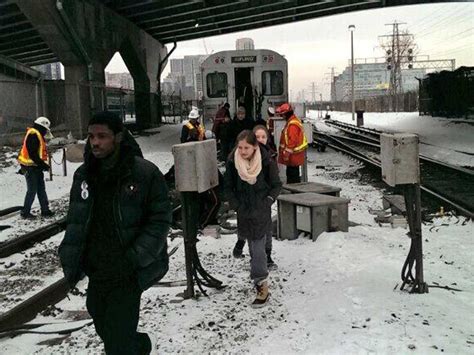 Riders forced to walk on tracks, take shuttles after electrical problems shut down service on part of Green Line